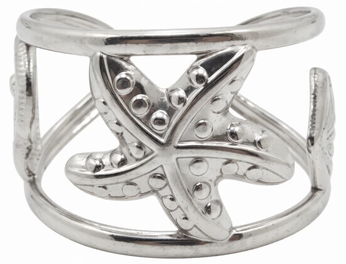 Anillo de acero quirugico estrella, ostra, caracol